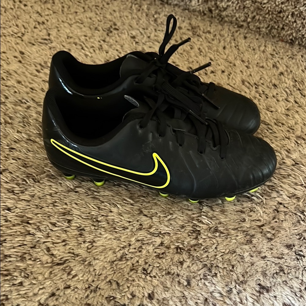 Nike Black and Yellow cleats with Sleek Design